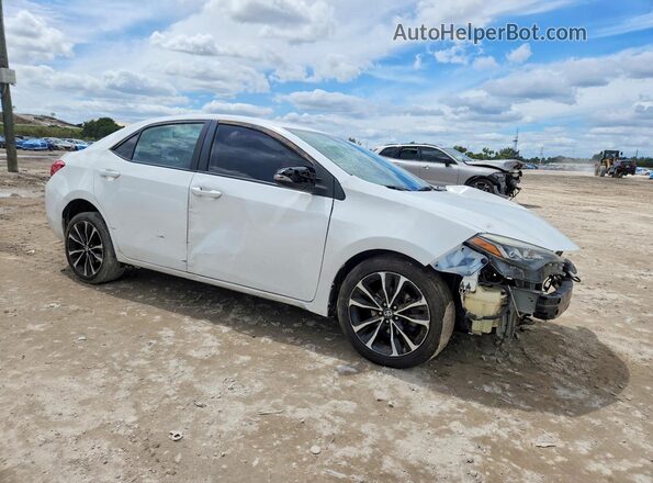 5YFBURHE1KP856286 2019 TOYOTA COROLLA White Delantero derecho