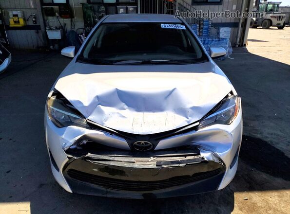 5YFBURHE1KP899512 2019 TOYOTA COROLLA Серебряный Вид спереди