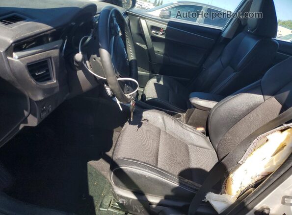 5YFBURHE2GP533016 2016 TOYOTA COROLLA Silver Vista interior delantera