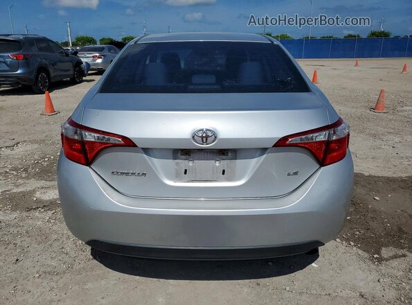 5YFBURHE2GP540709 2016 TOYOTA COROLLA Silver Հետևի տեսք