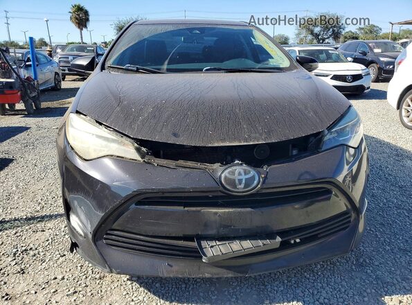 5YFBURHE2HP571931 2017 TOYOTA COROLLA Black Դիմացի տեսք