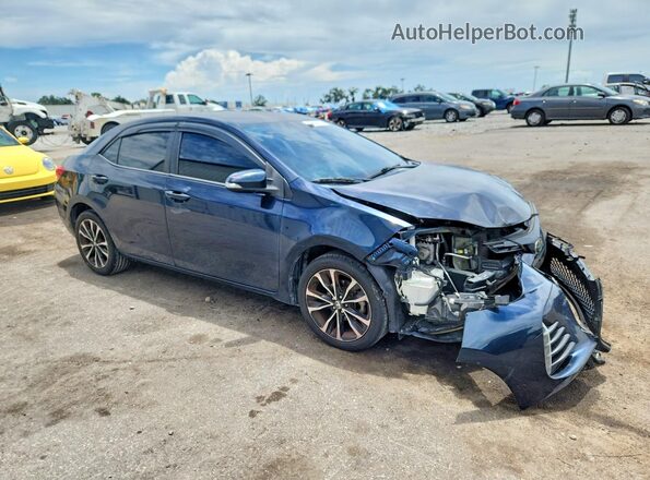 5YFBURHE2KP879995 2019 TOYOTA COROLLA Синий Передняя правая четверть