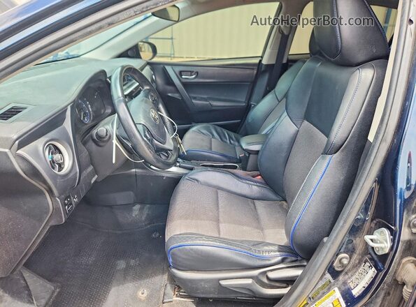 5YFBURHE2KP879995 2019 TOYOTA COROLLA Синий Вид салона спереди