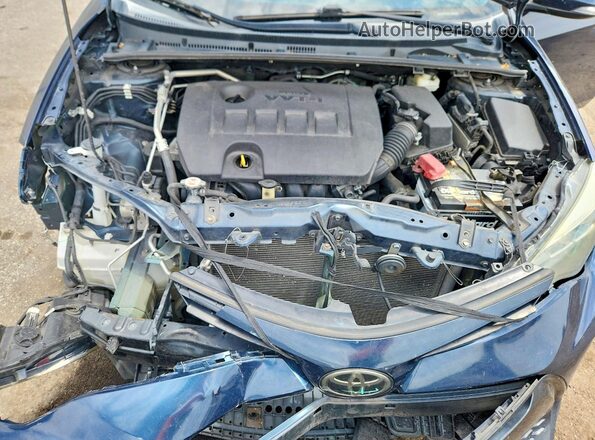 5YFBURHE2KP879995 2019 TOYOTA COROLLA Синий Вид задней части салона