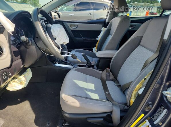 5YFBURHE2KP912459 2019 TOYOTA COROLLA Синий Вид салона спереди