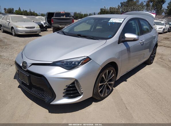 5YFBURHE3JP826141 2018 TOYOTA COROLLA Silver Przód lewy