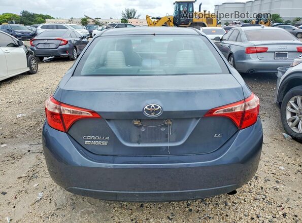 5YFBURHE3JP852884 2018 TOYOTA COROLLA Gray Հետևի տեսք