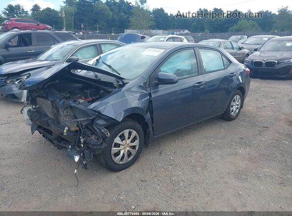 5YFBURHE4GP384933 2016 TOYOTA COROLLA Gray Առջևի ձախ երեք քառորդ տեսարան