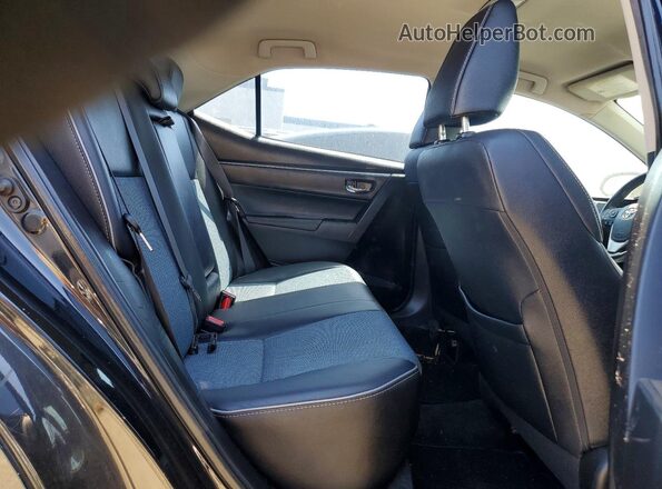5YFBURHE4GP488869 2016 TOYOTA COROLLA Black Vista de los asientos traseros
