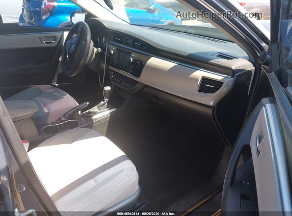 5YFBURHE4GP498320 2016 TOYOTA COROLLA Серый Вид салона спереди