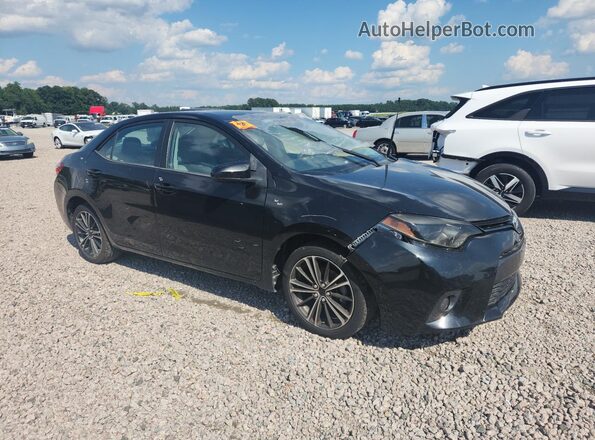 5YFBURHE4GP534295 2016 TOYOTA COROLLA Black Widok wnętrza z przodu