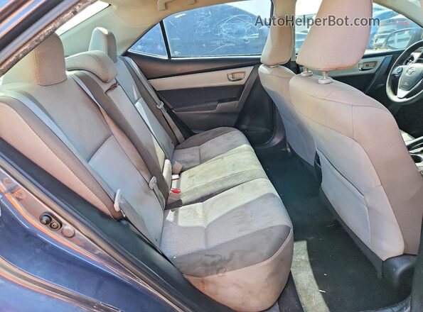 5YFBURHE4HP574328 2017 TOYOTA COROLLA Gray Vista de los asientos traseros