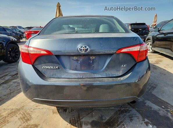 5YFBURHE4HP574328 2017 TOYOTA COROLLA Gray Vista trasera