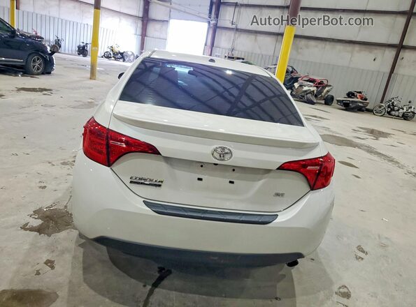 5YFBURHE4HP604752 2017 TOYOTA COROLLA White Вид ззаду