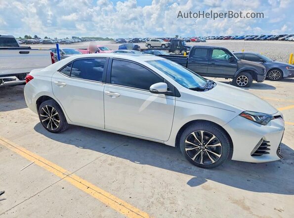 5YFBURHE4HP630221 2017 TOYOTA COROLLA White Przód prawy