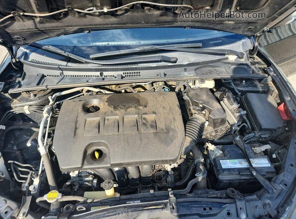 5YFBURHE4HP638724 2017 TOYOTA COROLLA Черный Вид задней части салона