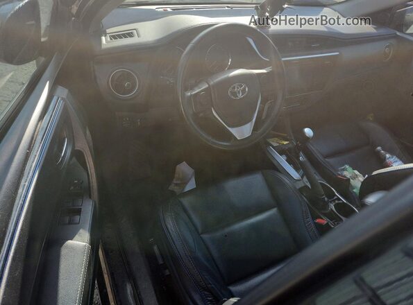 5YFBURHE4HP638724 2017 TOYOTA COROLLA Черный Вид панели приборов