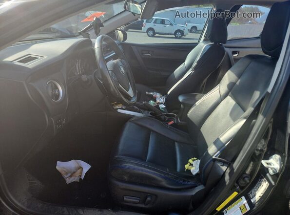 5YFBURHE4HP638724 2017 TOYOTA COROLLA Черный Вид салона спереди