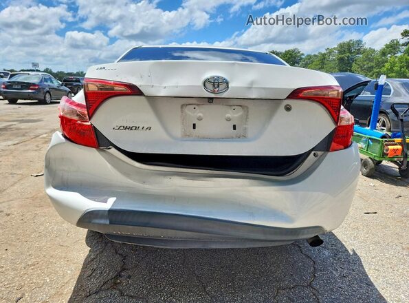 5YFBURHE4HP684652 2017 TOYOTA COROLLA White Вид ззаду