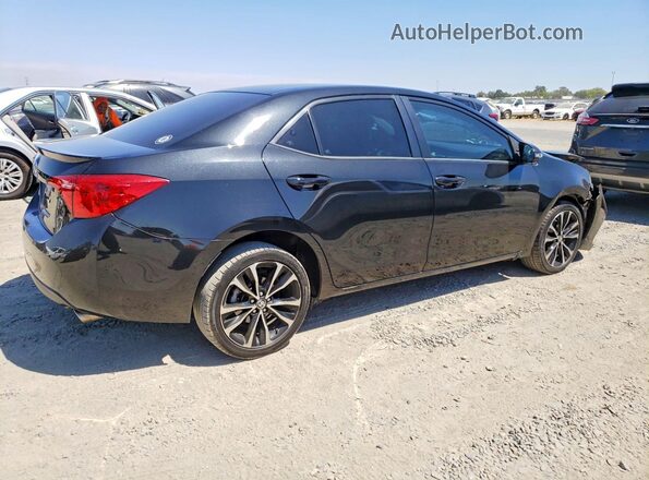 5YFBURHE4HP689057 2017 TOYOTA COROLLA Black Հետևի աջ