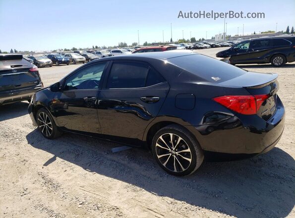 5YFBURHE4HP689057 2017 TOYOTA COROLLA Black Հետևի ձախ