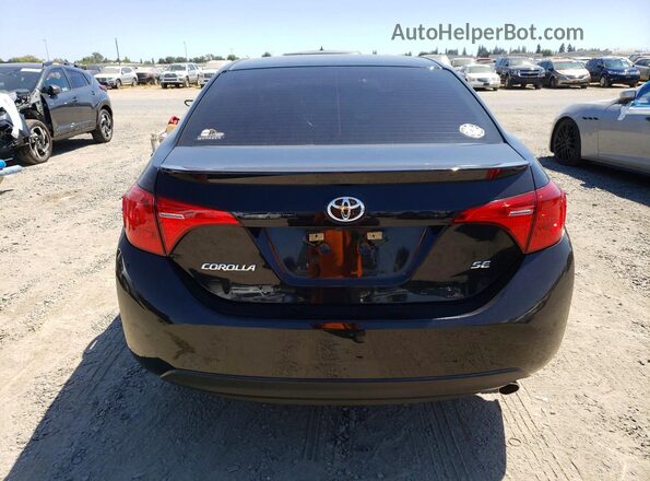 5YFBURHE4HP689057 2017 TOYOTA COROLLA Black Հետևի տեսք