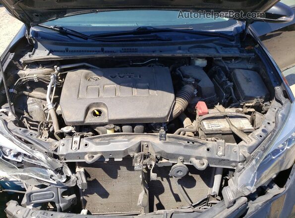 5YFBURHE4HP689057 2017 TOYOTA COROLLA Black Սալոնի հետևի տեսք