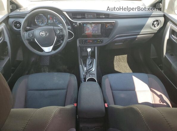 5YFBURHE4HP710487 2017 TOYOTA COROLLA White Dashboard view