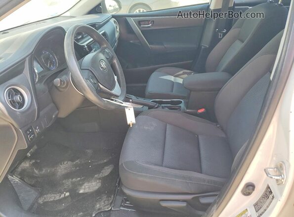 5YFBURHE4HP710487 2017 TOYOTA COROLLA White Front interior view
