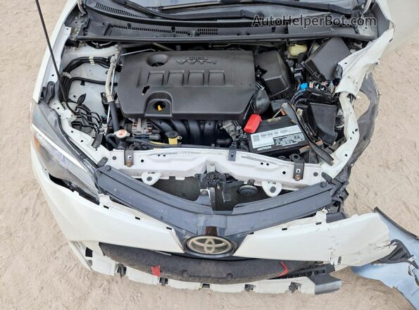 5YFBURHE4HP724793 2017 TOYOTA COROLLA White Սալոնի հետևի տեսք