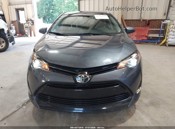 5YFBURHE4JP751465 2018 TOYOTA COROLLA Gray Instrument cluster view