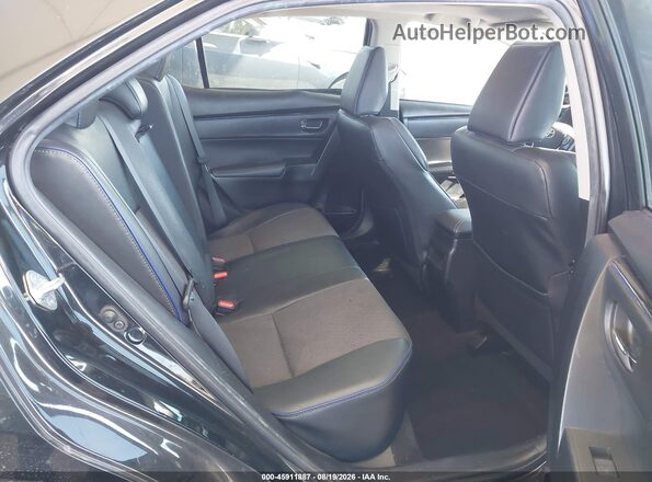 5YFBURHE4JP771473 2018 TOYOTA COROLLA Black Вид наклейки з VIN-кодом