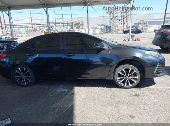 5YFBURHE4JP771473 2018 TOYOTA COROLLA Black Вид задньої частини салону