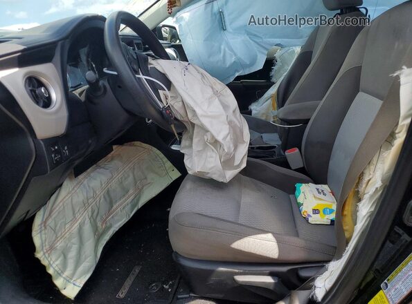 5YFBURHE4JP849976 2018 TOYOTA COROLLA Black Vista interior delantera