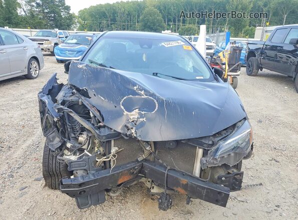 5YFBURHE4JP849976 2018 TOYOTA COROLLA Black Vista frontal