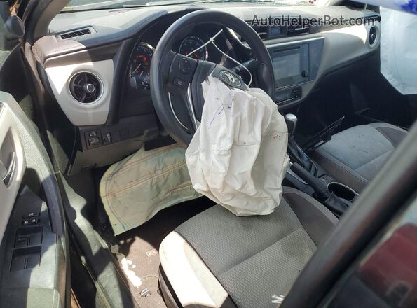 5YFBURHE4JP849976 2018 TOYOTA COROLLA Black Vista del salpicadero