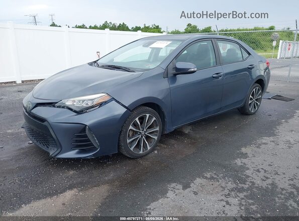 5YFBURHE4KP864303 2019 TOYOTA COROLLA Серый Передняя левая четверть