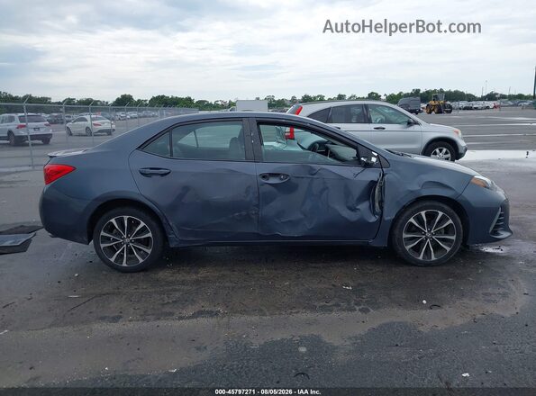 5YFBURHE4KP864303 2019 TOYOTA COROLLA Серый Вид задней части салона