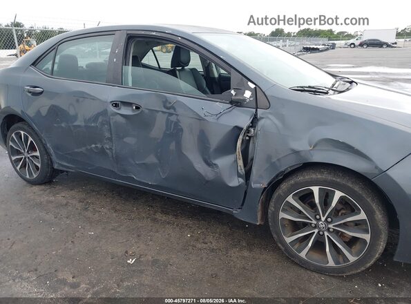 5YFBURHE4KP864303 2019 TOYOTA COROLLA Серый Вид спереди