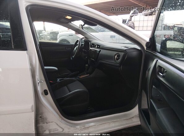 5YFBURHE4KP875480 2019 TOYOTA COROLLA White Front interior view