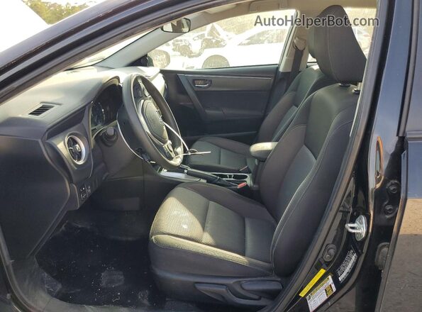 5YFBURHE4KP879903 2019 TOYOTA COROLLA Black Vista interior delantera