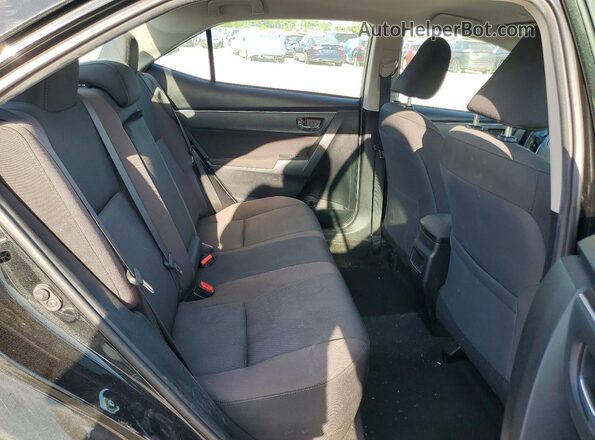 5YFBURHE4KP879903 2019 TOYOTA COROLLA Black Vista de los asientos traseros