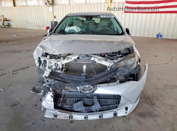 5YFBURHE4KP912589 2019 TOYOTA COROLLA Silver Rear view