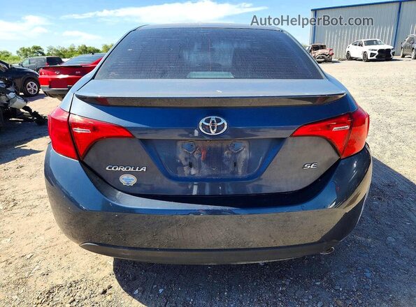 5YFBURHE4KP924239 2019 TOYOTA COROLLA Gray Rear view