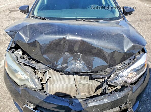 5YFBURHE5GP485995 2016 TOYOTA COROLLA Black Rear interior view