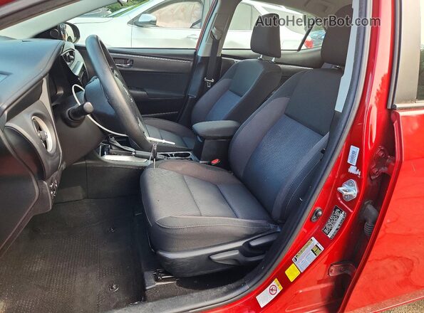 5YFBURHE5HP669223 2017 TOYOTA COROLLA Red წინა სალონის ხედი