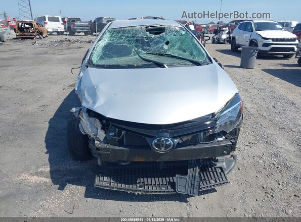 5YFBURHE5HP691965 2017 TOYOTA COROLLA Silver Вид задньої частини салону