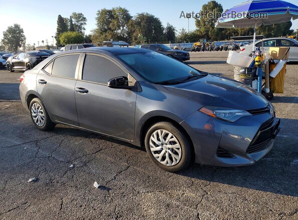 5YFBURHE5JP855429 2018 TOYOTA COROLLA Gray Առջևի աջ