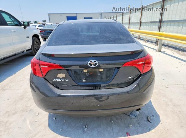 5YFBURHE5KP876122 2019 TOYOTA COROLLA Black Հետևի տեսք