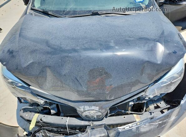 5YFBURHE5KP876122 2019 TOYOTA COROLLA Black Սալոնի հետևի տեսք